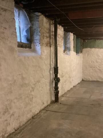 Complete Basement Waterproofing Transformation in Buffalo, NY - Before Photo