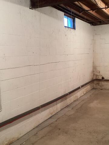 Bowing Wall Stabilized in Grand Island, NY - Before Photo