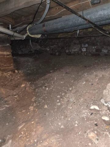 Crawl Space Waterproofing System Installed in Ontario, NY - Before Photo