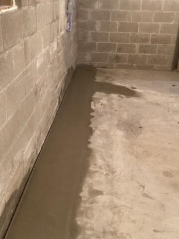 New Interior Drainage System Installed for a Wet Basement in Holland, NY
