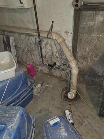 Humidity and Water Intrusion Tackled in Fairport, NY Basement - Before Photo