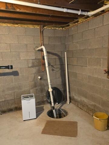 Sump Pump Upgraded in Wet Canandaigua, NY Basement - Before Photo