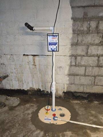 Upgraded Sump Pump Added to West Rochester, NY Basement - After Photo
