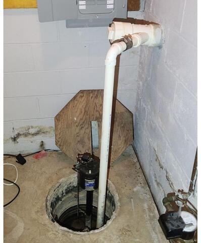 Sump Pump System Upgrade in Rochester, NY Basement - Before Photo