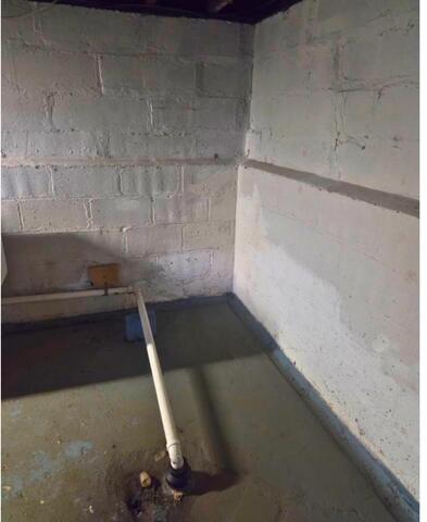 A Super New Sump Pump System Added To A Struggling Basement In Rochester, NY - Before Photo