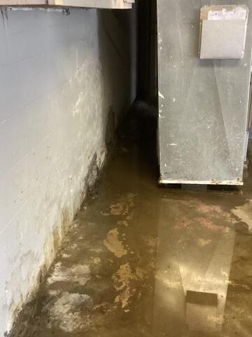 Innovative Interior Basement Drainage System Installed In Batavia, NY - Before Photo
