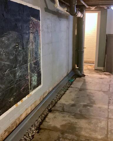 Drainage System Added To Wet Basement in Rochester, NY - Before Photo