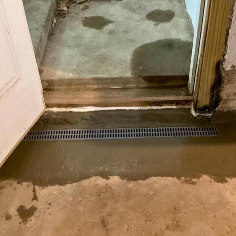 Drainage System For Doorway Added in Webster, NY Basement - After Photo