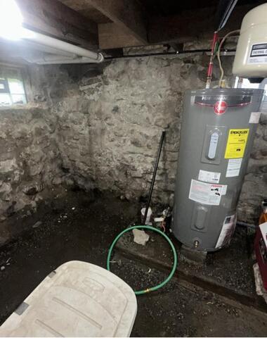 Waterproofing System To Help Create a Dry Basement in Gasport, NY - Before Photo