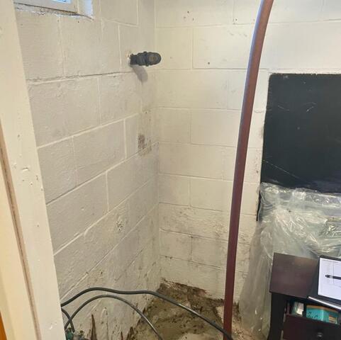 Cracked and Leaking Wall in Le Roy, NY Fixed - Before Photo