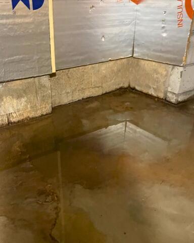 Drainage System Installed in Fairport, NY, to Capture Water Seepage - Before Photo