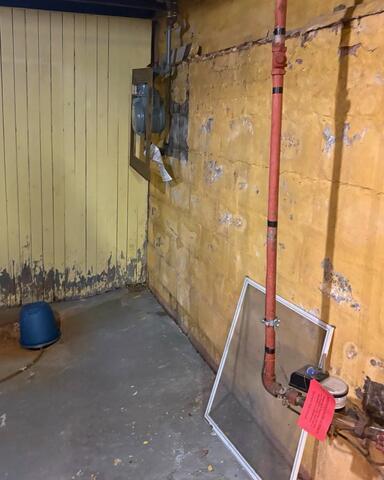 Water-Damaged Basement Transformed Down in an Amherst, NY, Home - Before Photo