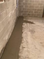 New Interior Drainage System Installed for a Wet Basement in Holland, NY