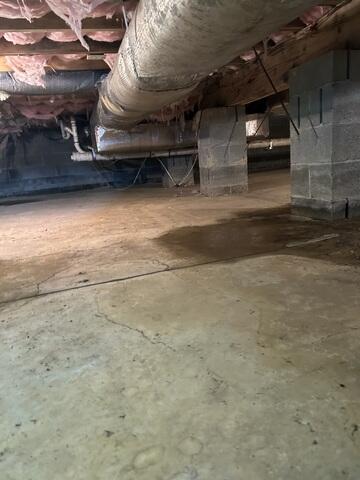 Crawlspace Encapsulation in Hartly, DE - Before Photo