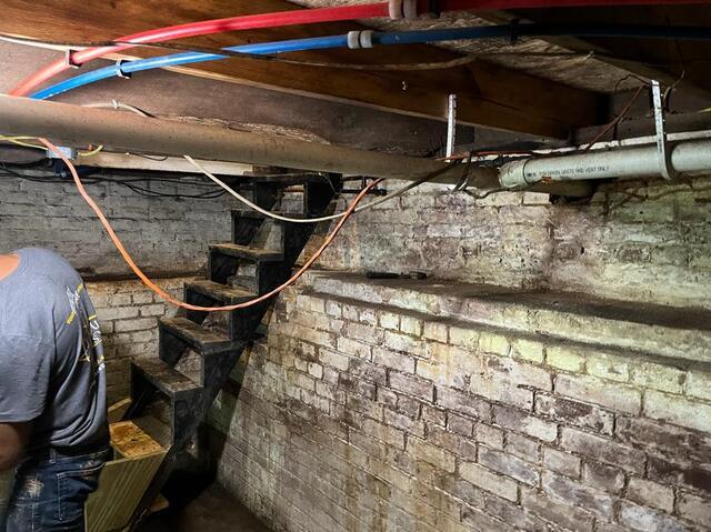 Full Crawlspace Encapsulation & Drainage System Install - Before Photo