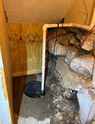 Waterproofing System Upgrade in New Bedford, MA - Before Photo