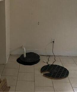 TripleSafe Sump Pump Installation in Hyde Park, MA - Before Photo