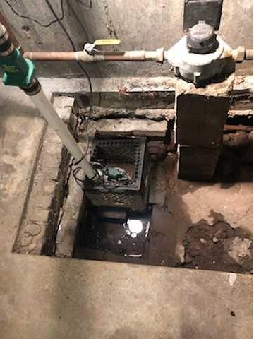 Protecting a Home's Utilities from Water in Milton, MA - Before Photo