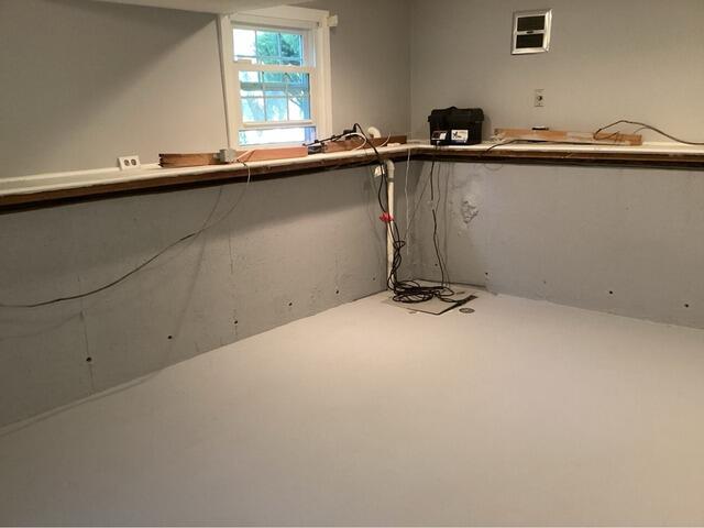 Improving a Finished Basement's Waterproofing System in Bridgewater, MA - Before Photo