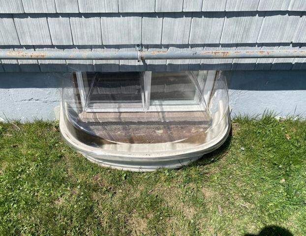 Our Sunhouse Window Enclosures Help Waterproof a Basement in Warwick, RI - After Photo