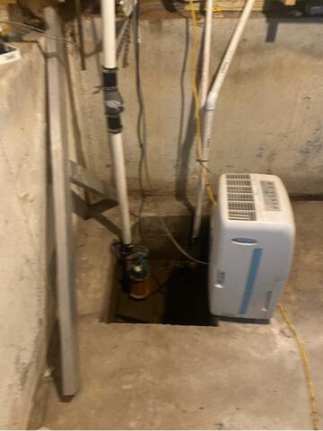 Waterproofing an Unfinished Basement in East Bridgewater, MA - Before Photo