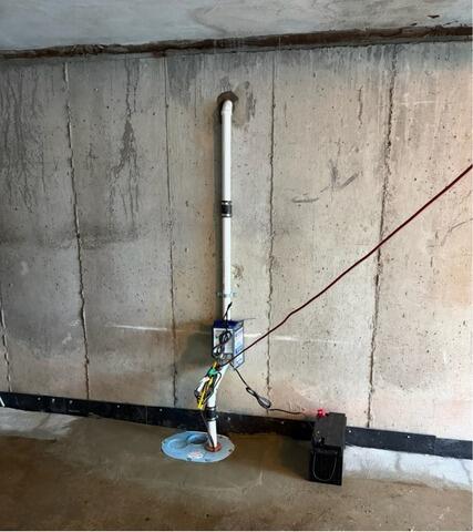 Sump Pump System Upgrade in a Boston, MA Garage - After Photo