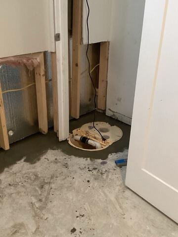 Waterproofing a Finished Basement in Brighton, MA - Before Photo