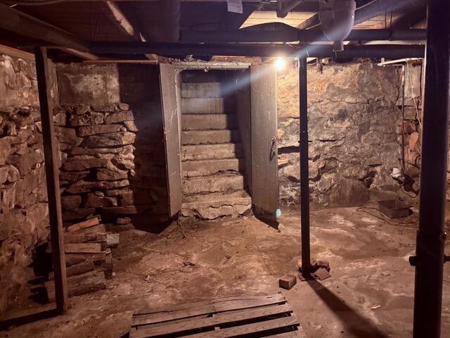 Stone and Dirt Basement Moisture Control in Douglas, MA - Before Photo