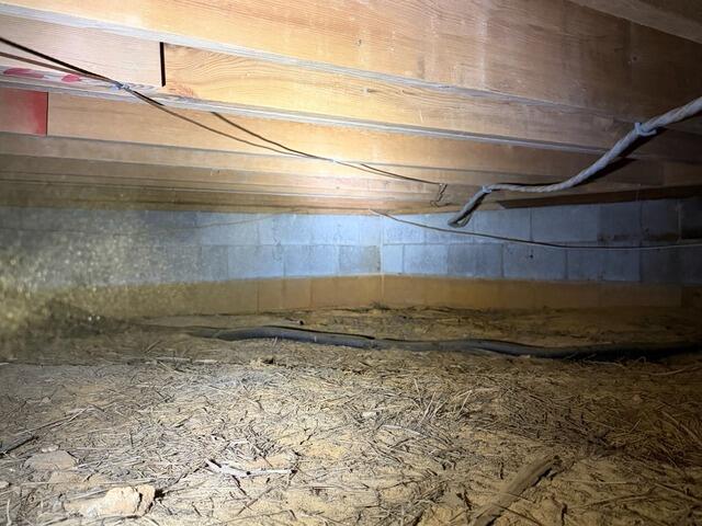 Wellfleet, MA Cottage Crawl Space Vapor Barrier - Before Photo