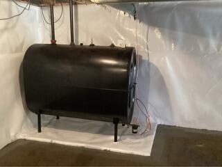 Protecting an Oil Tank from Water in a Belchertown, MA Basement