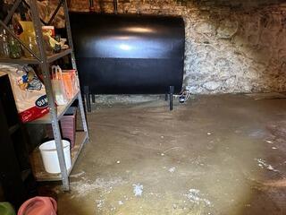 Protecting an Oil Tank from Water in a Belchertown, MA Basement