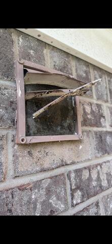 Birds Nest in the Broken Exhaust Vent in Bayville, NJ - Before Photo