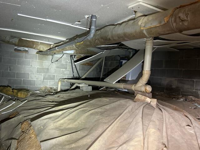 Crawl Space Transformation in Chattanooga, TN with Full Encapsulation and Moisture Control - Before Photo