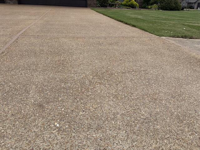 Driveway Concrete Lifting and Sealing Restored Safety and Curb Appeal - After Photo