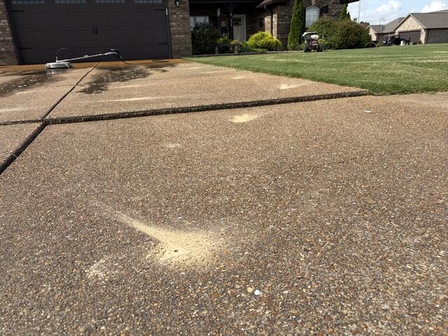 Driveway Concrete Lifting and Sealing Restored Safety and Curb Appeal - Before Photo
