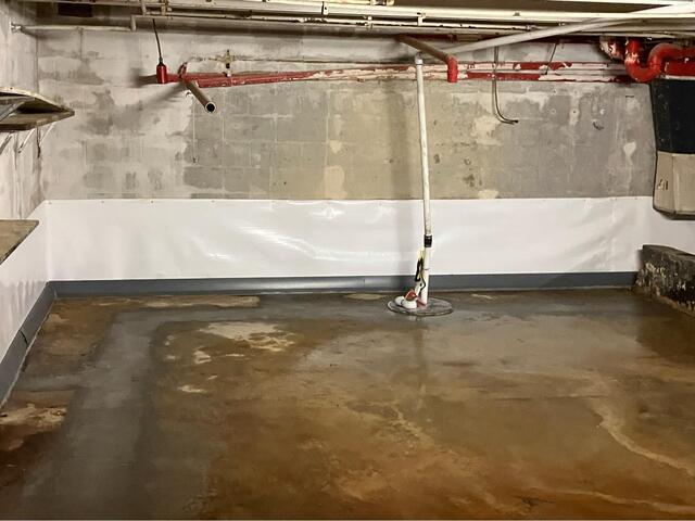 Basement Waterproofing for a Former Jiffy Lube Turned Title Max - After Photo