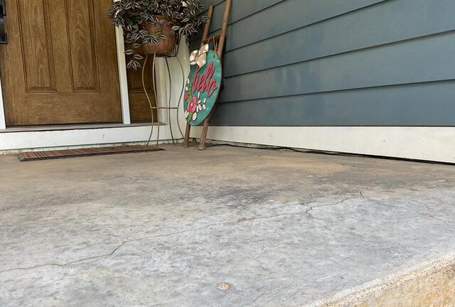 Front Porch Lift Restores Safety and Curb Appeal in Sage, AR - Before Photo