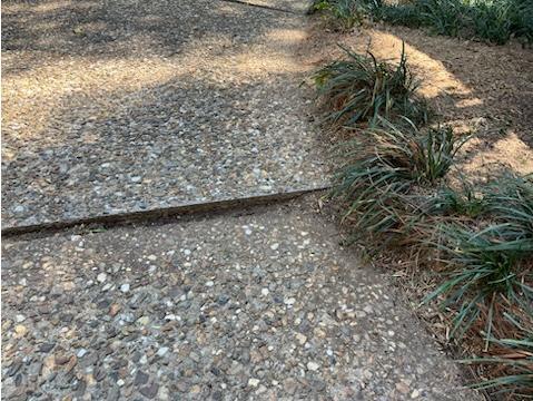 Driveway Leveling and Water Control in Little Rock, AR Restores Safety and Home Value - Before Photo