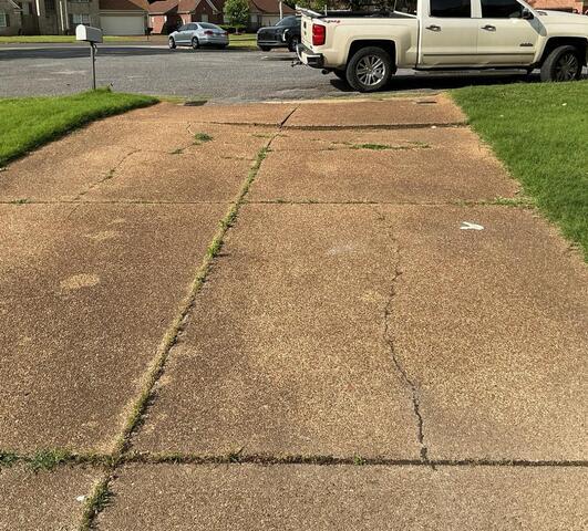 Memphis, TN Driveway Concrete Leveling and Joint Sealing Repair - Before Photo