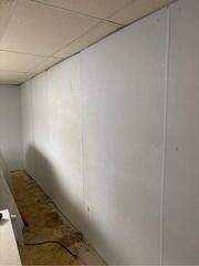 Cracked Basement Wall Transformed with CarbonArmor and BrightWall in Mantachie, MS