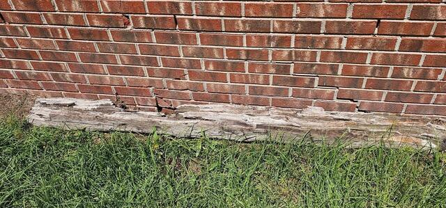 Sinking Home Repair With Foundation Pier System in Fayetteville, NC