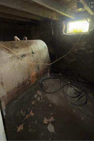 Basement Floor Support in Winchester, New Hampshire, by Matt Clark's Northern Basement Systems. - Before Photo