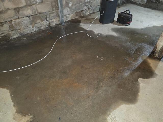 Basement Waterproofing in Keene, New Hampshire, by Matt Clark's Northern Basement Systems. - Before Photo