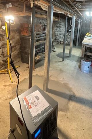 Basement Waterproofing and SmartJack Support Installation in Errol, NH | Matt Clark's Northern Basement Systems - After Photo