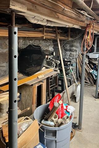 Basement Waterproofing and SmartJack Support Installation in Errol, NH | Matt Clark's Northern Basement Systems - Before Photo