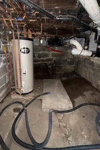 Basement Waterproofing in East Ryegate, Vermont | Matt Clark's Northern Basement Systems - Before Photo