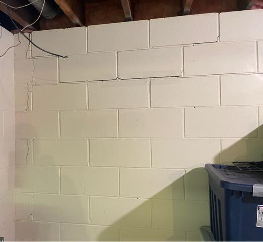 Cracked basement wall in Chanhassen, MN stabilized with PowerBrace™ system