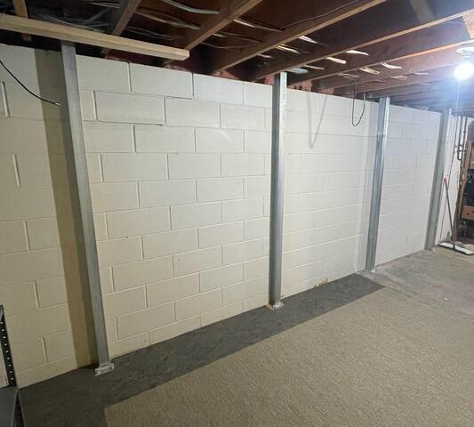 Cracked basement wall in Chanhassen, MN stabilized with PowerBrace™ system