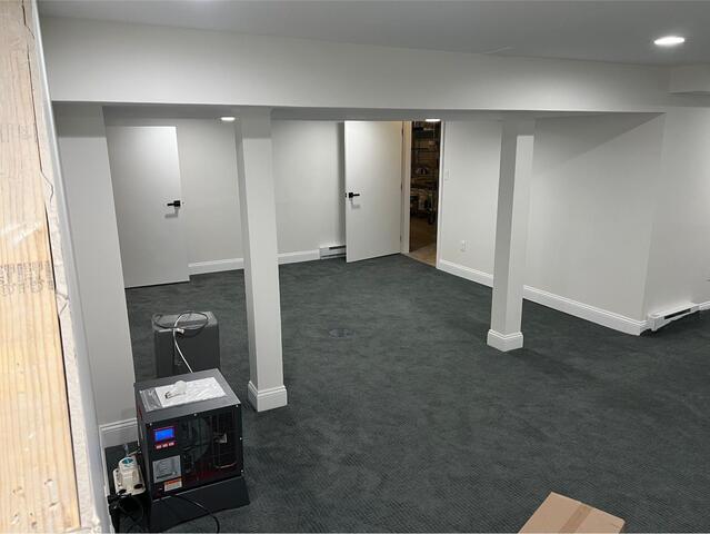 Replacing Flooring in a Basement in West Hartford, CT - Before Photo