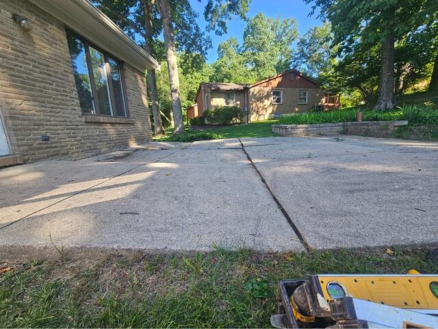 Concrete Pad Lifting in Cincinnati, OH - Before Photo